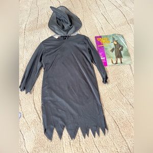 Halloween costume. Child witch